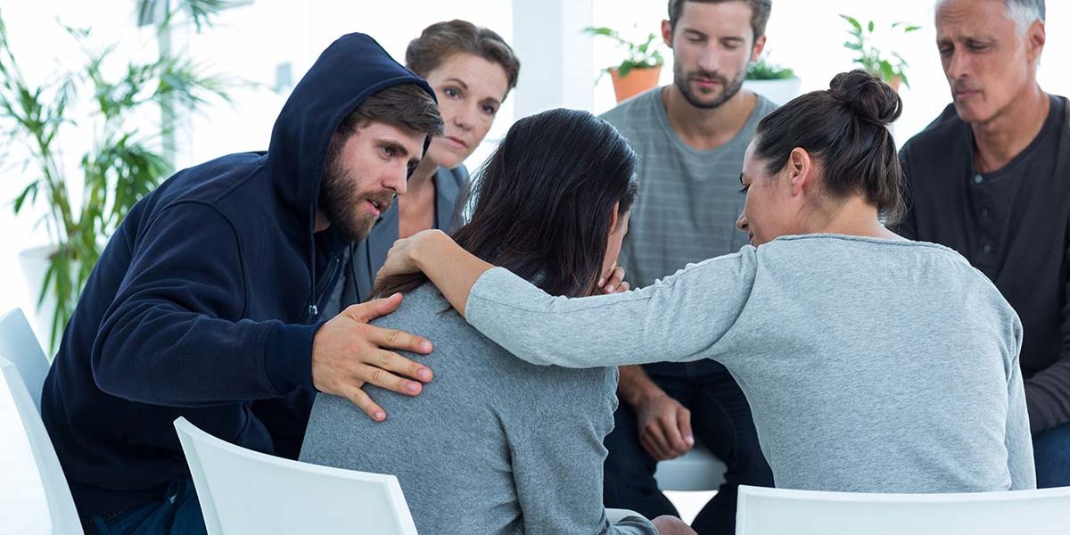 narcotics anonymous group meeting supporting woman in Florida