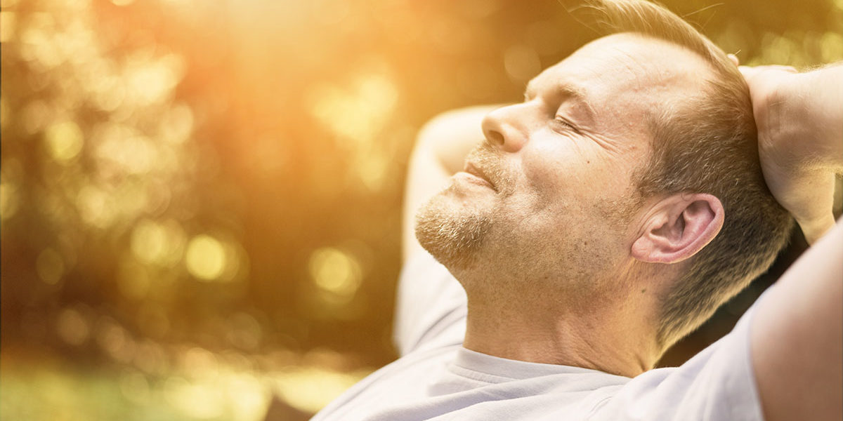 a man relaxing after going through detox recovery