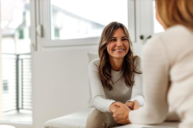 a woman talking to her doctor about an oxycontin detox program
