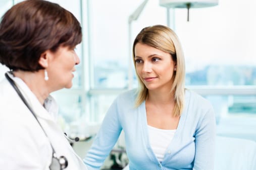 Woman talking to clinician about affordable detox programs in Florida