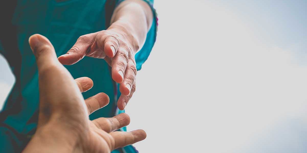 Drug-Addiction-Help-First-Steps hands reaching out for drug addiction help