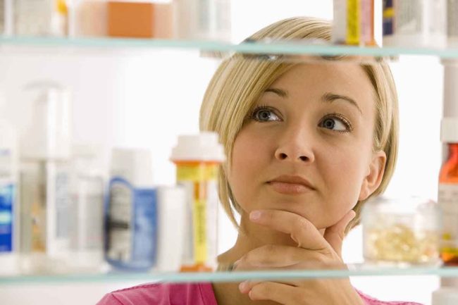 a woman wonders if her medicine cabinet has the most abused prescription drugs