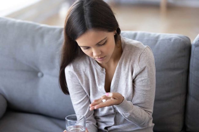 woman looking at heroin detox drugs