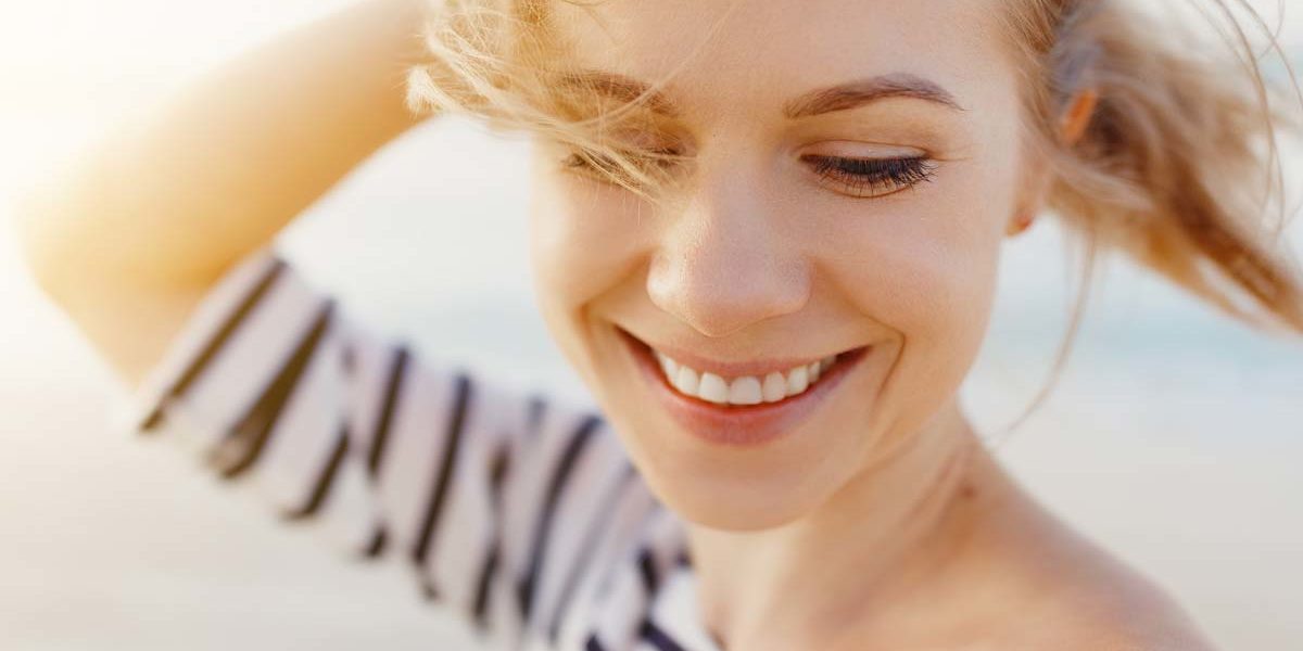 sobriety close up of smiling woman enjoying nature and the balance of medication and sobriety