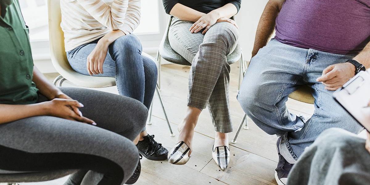 group meeting to discuss help for alcoholics