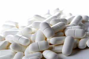 Pile of precription pills may show the Xanax effects when taken.
