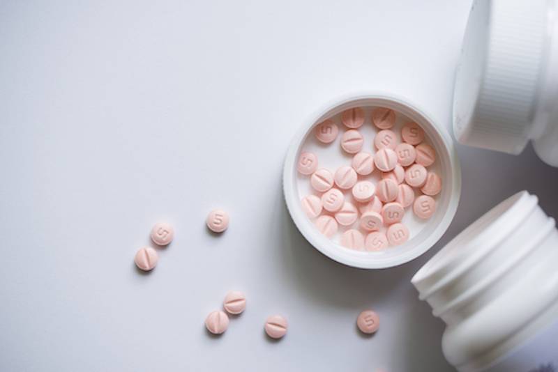 a bottle of pills represents oxy addiction