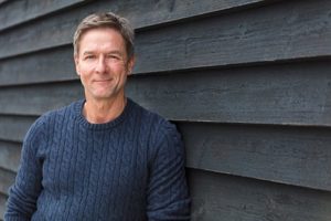 Smiling man not worried for himself during National Impaired Driving Prevention Month 2018