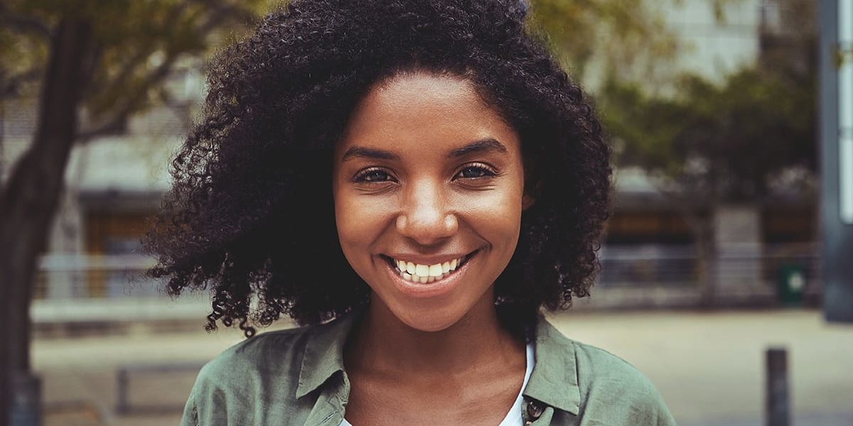 a woman happy with the answer to what is integrative medicine