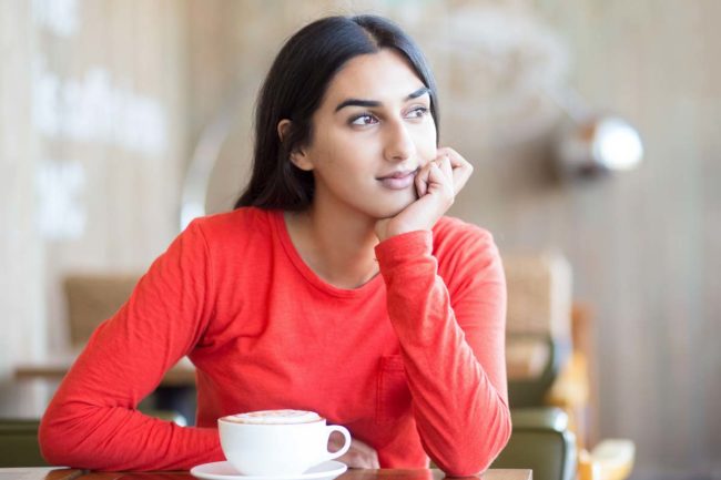 woman drinking coffee learning how to practice patience
