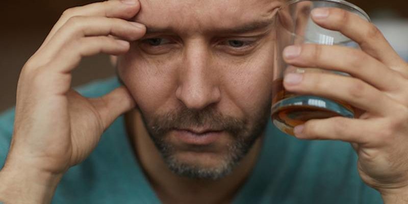 a man is considering quitting drinking