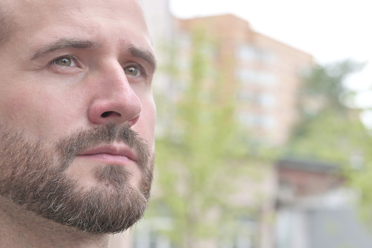 a man thinking about Addiction Help with Drug Rehab Rhode Island