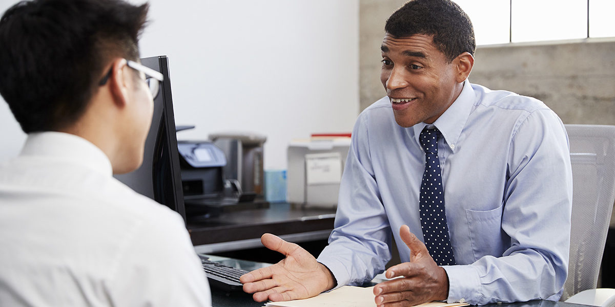 a doctor explaining the benefits of an Indiana detox center