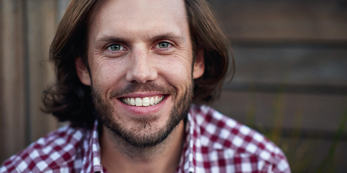 a man smiling during recover in a Detox in Paterson