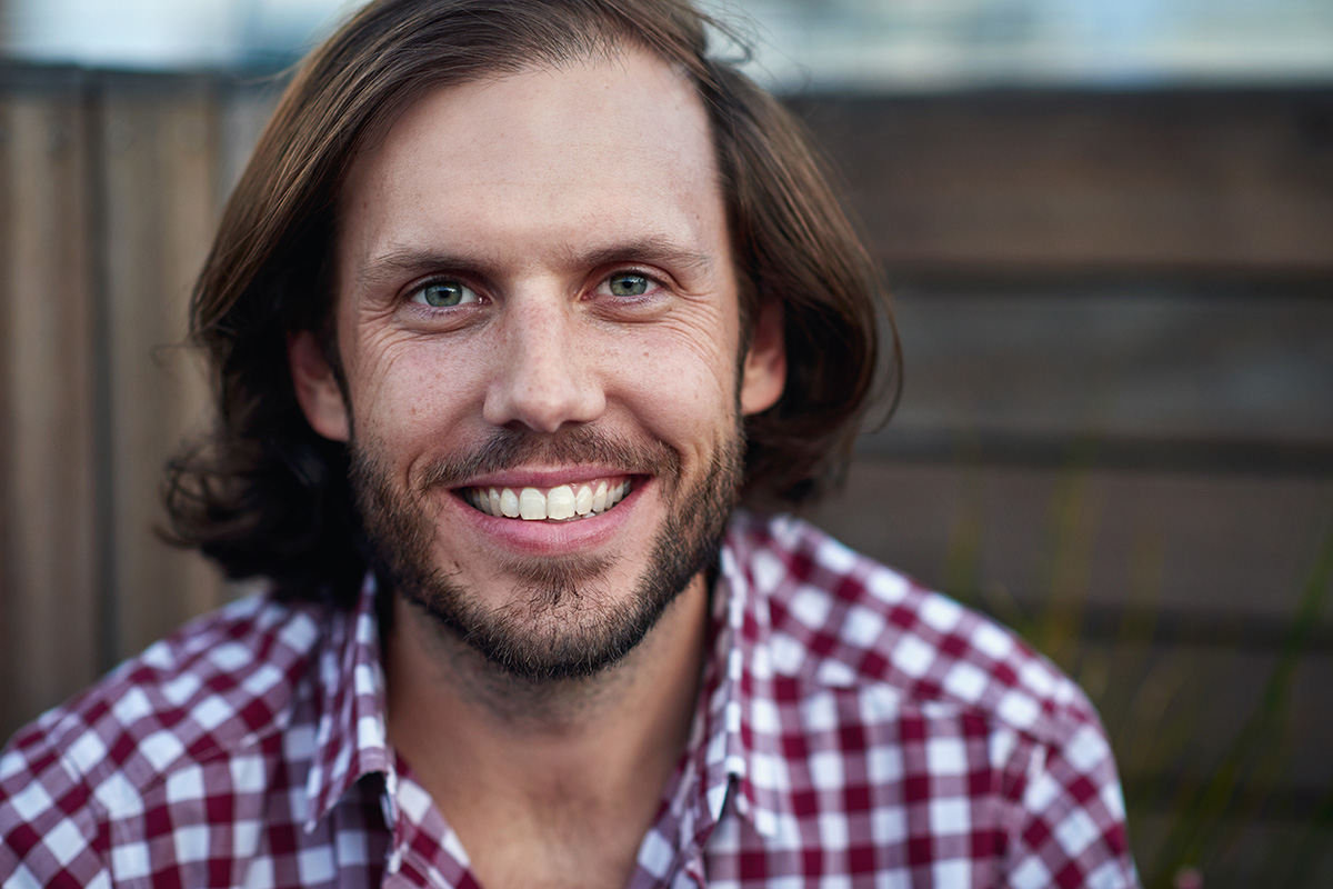 a man smiling during recover in a Detox in Paterson