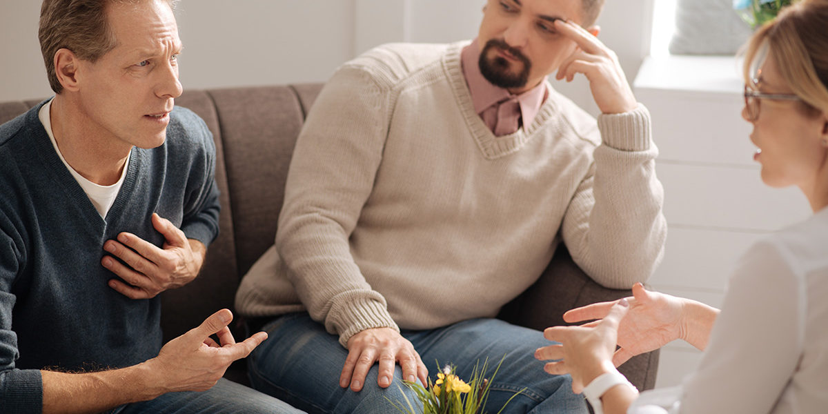 two men discussing the problems in detox center in Doral