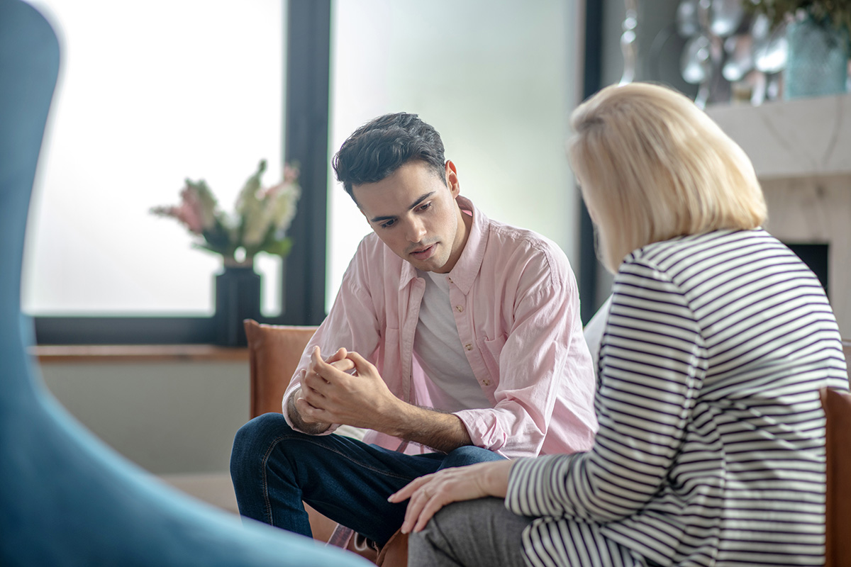 a doctor explaining common treatments for drug abuse to her patient