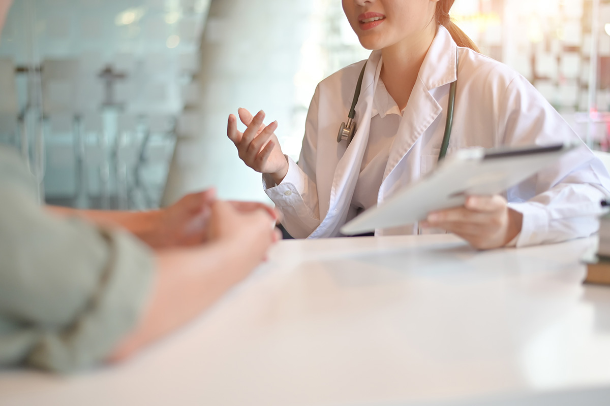 a doctor explaining dangers of prescription drug abuse