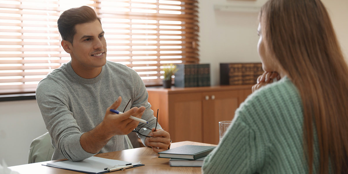 a man talking to to his doctor at a Iowa Detox Center