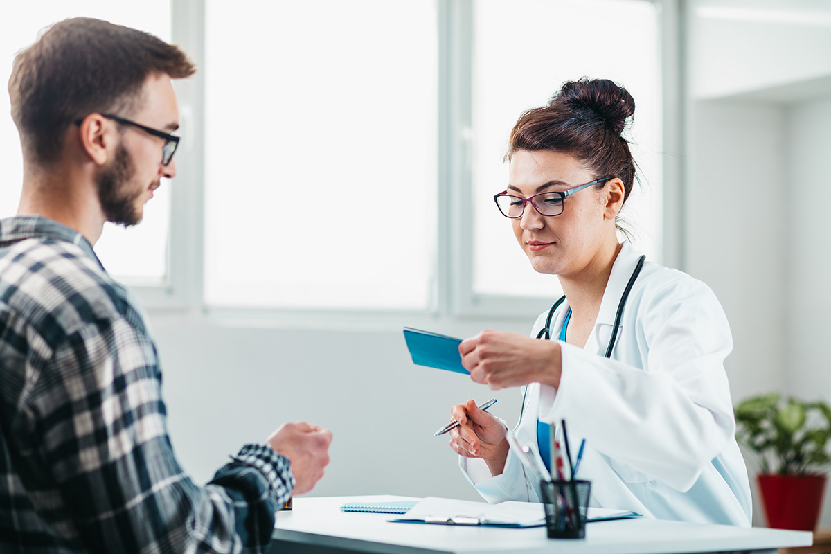 a doctor explaining the benefits of the Missouri detox