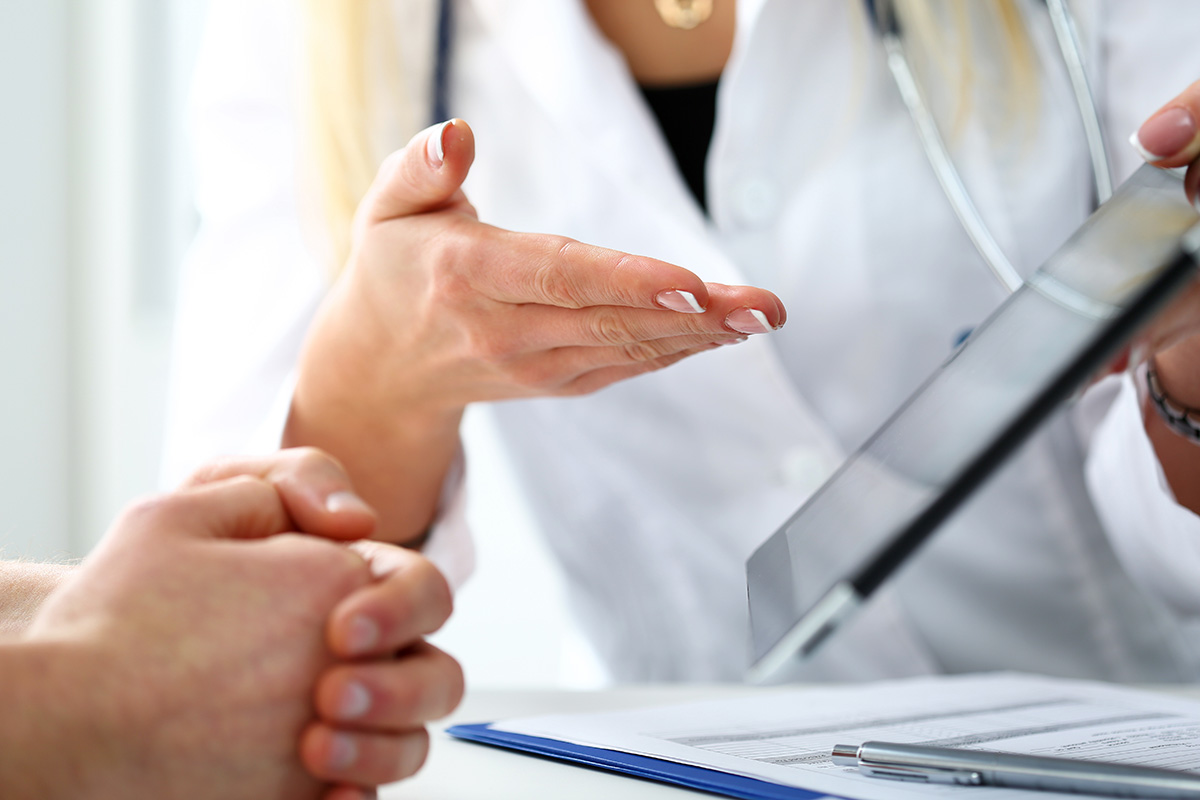 a doctor talking to a patient at a South Dakota drug detox