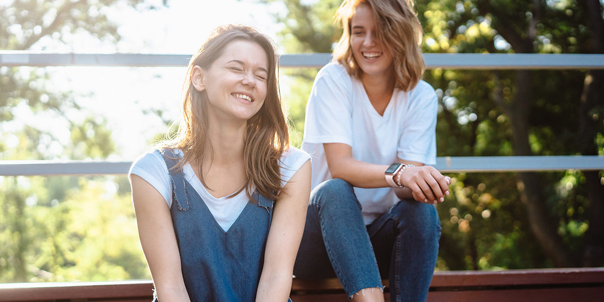 Two women smiling outside lancaster detox center