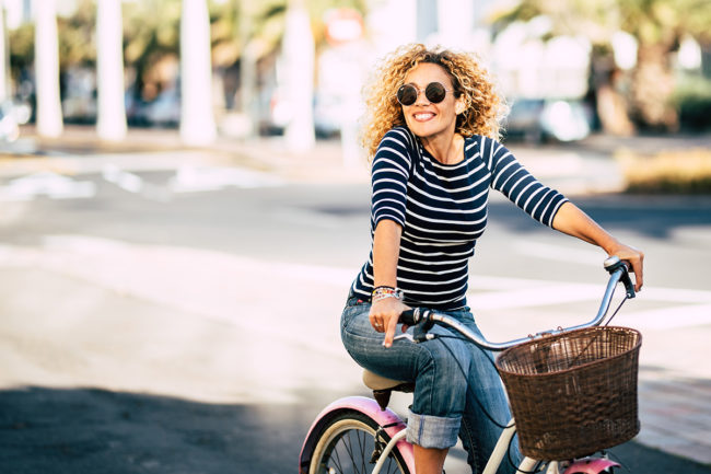 a woman biking during Wyoming drug detox