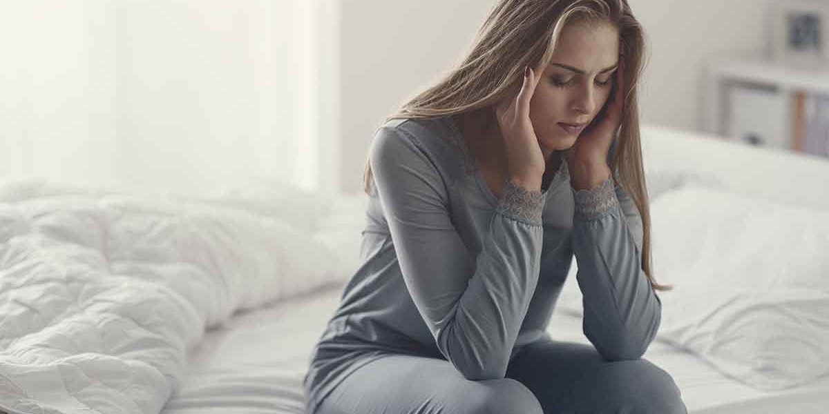 Dangerous Symptoms of Alcohol Withdrawal a woman struggles with the symptoms of alcohol withdrawal
