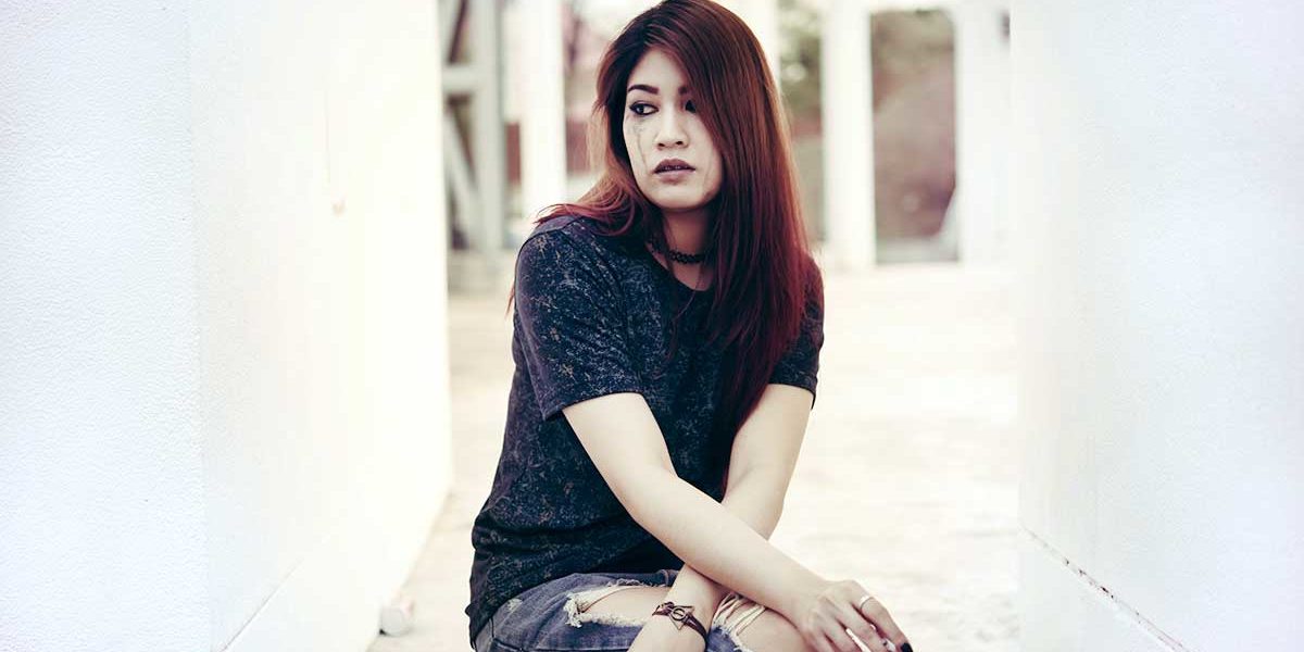 Woman considers the risks of prescription drug addiction