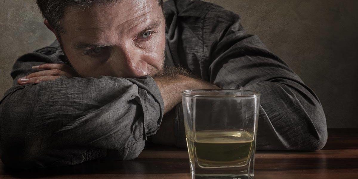 Avoidable Causes of Alcohol Addiction man considers avoidable causes of alcohol addiction