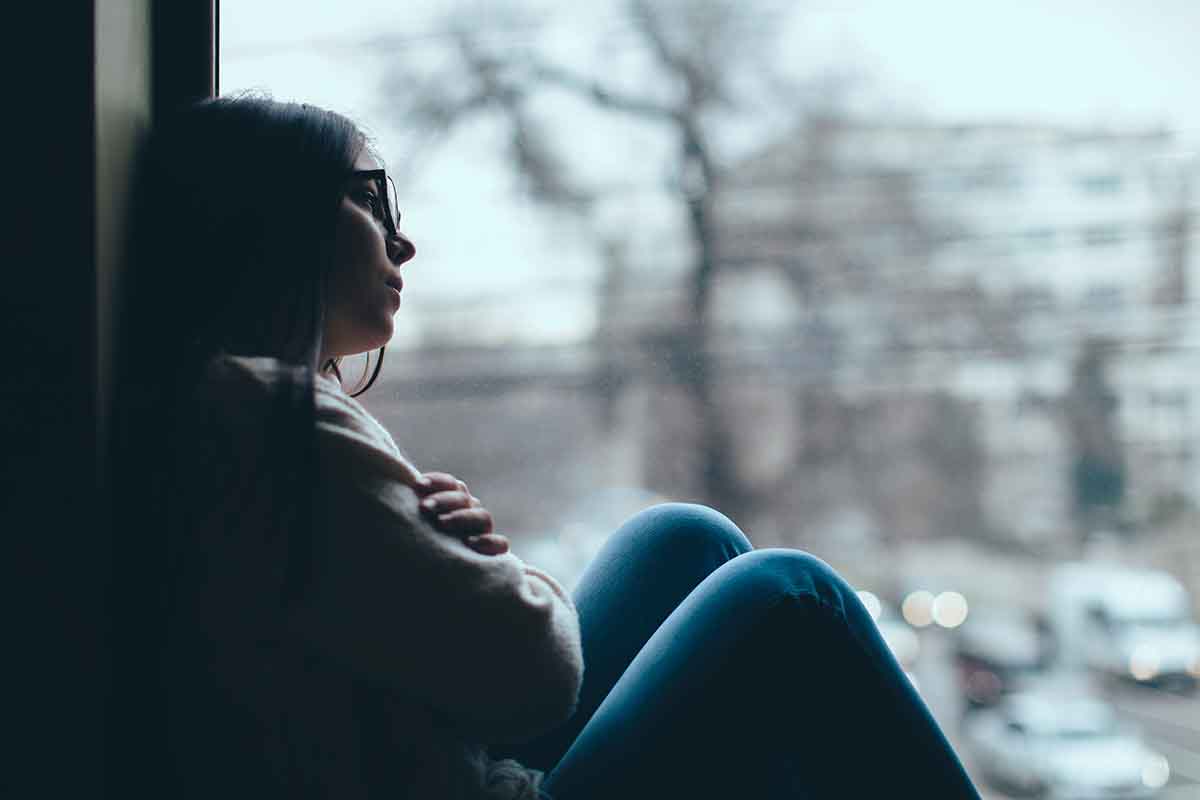 a woman suffers from seasonal depression and addiction