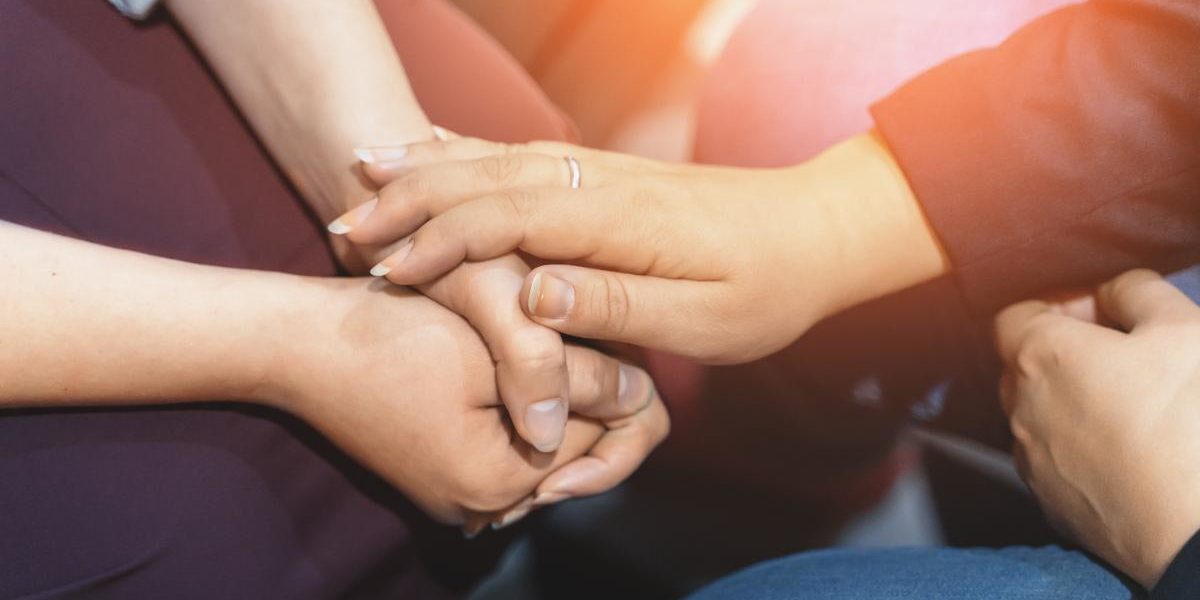 hands of people explaining what is talk therapy